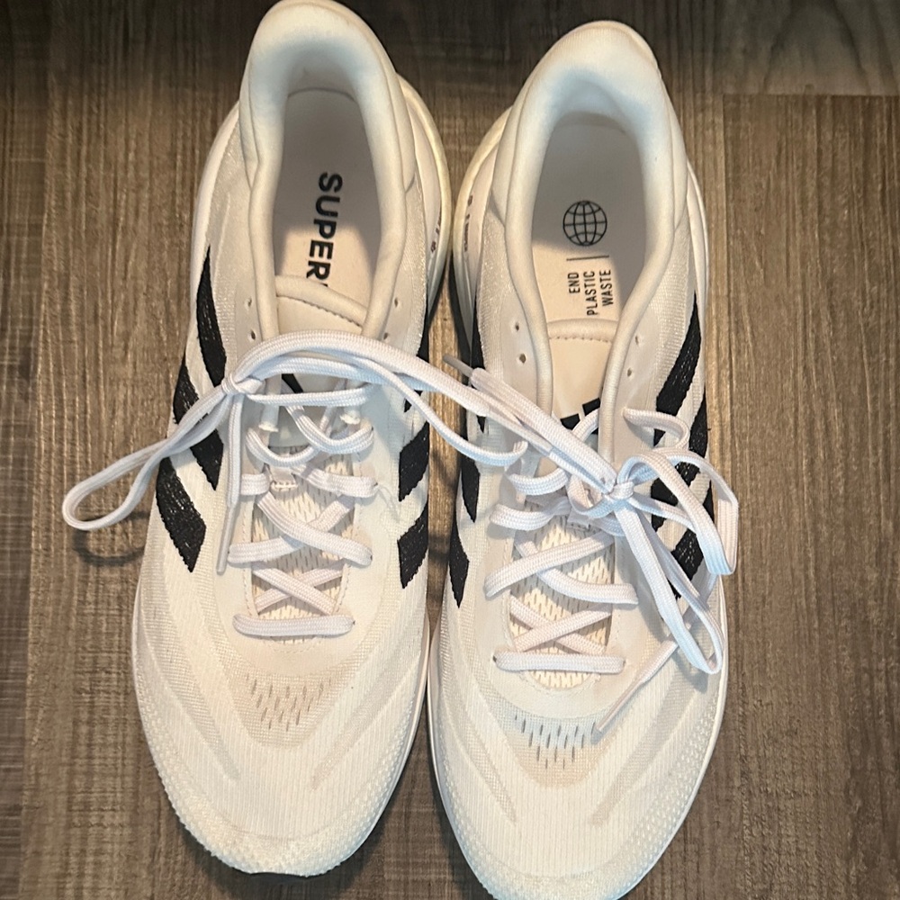Adidas Men's White Athletic Shoes with Black Stripes